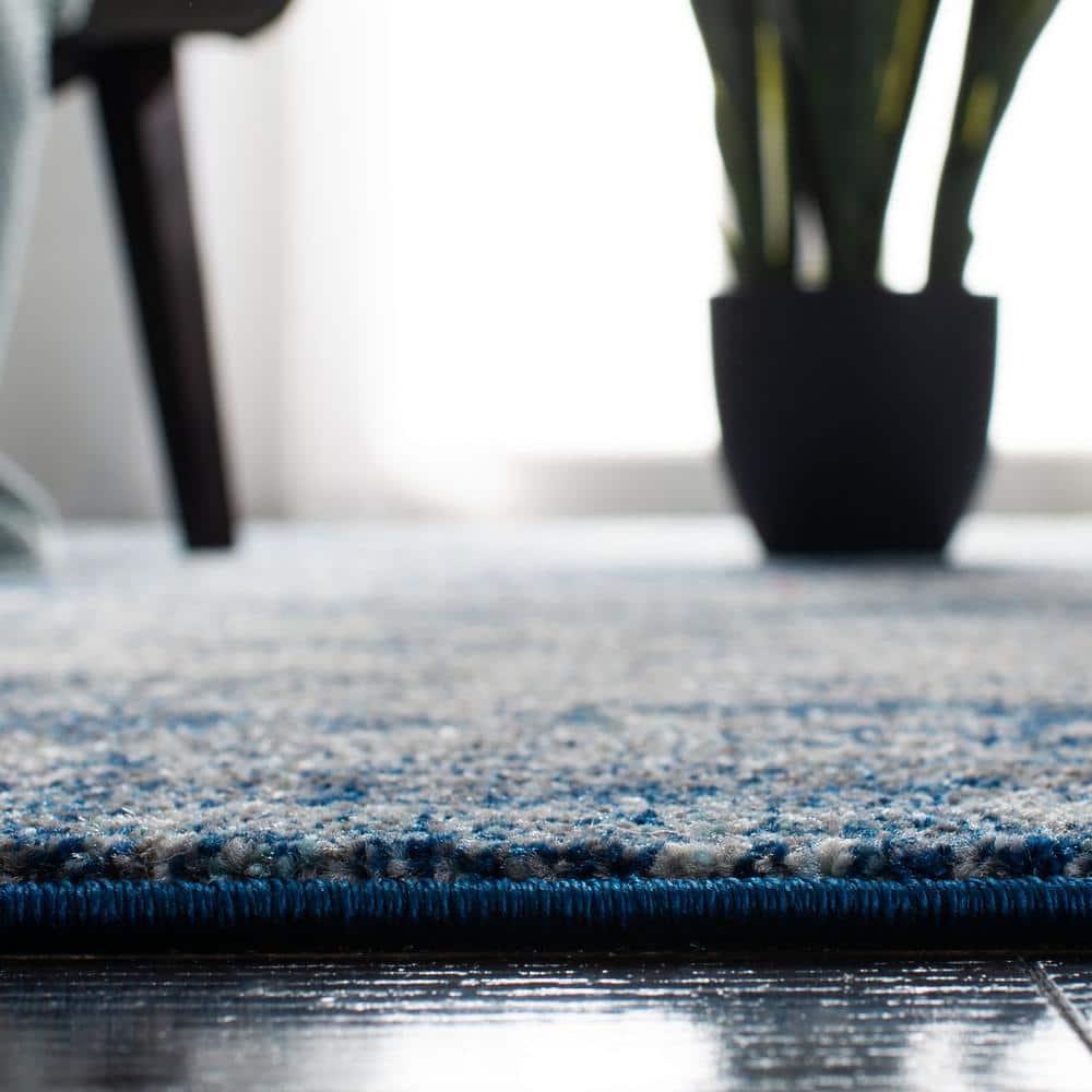 Evoke EVK272 Power Loomed Area Rug Navy / Ivory 6'-7" X 9' - Safavieh.
