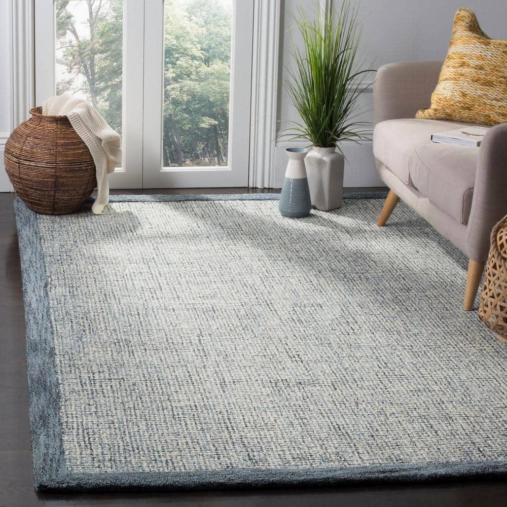SAFAVIEH Abstract Clive Bordered Wool Area Rug, Navy/Ivory, 5' x 8'