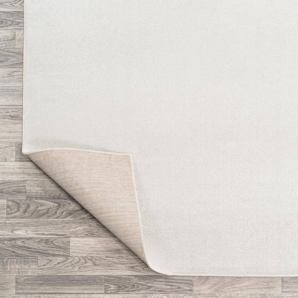JONATHAN Y Twyla Classic Solid Low-Pile Machine-Washable Cream 4 ft. x 6 ft. Area Rug