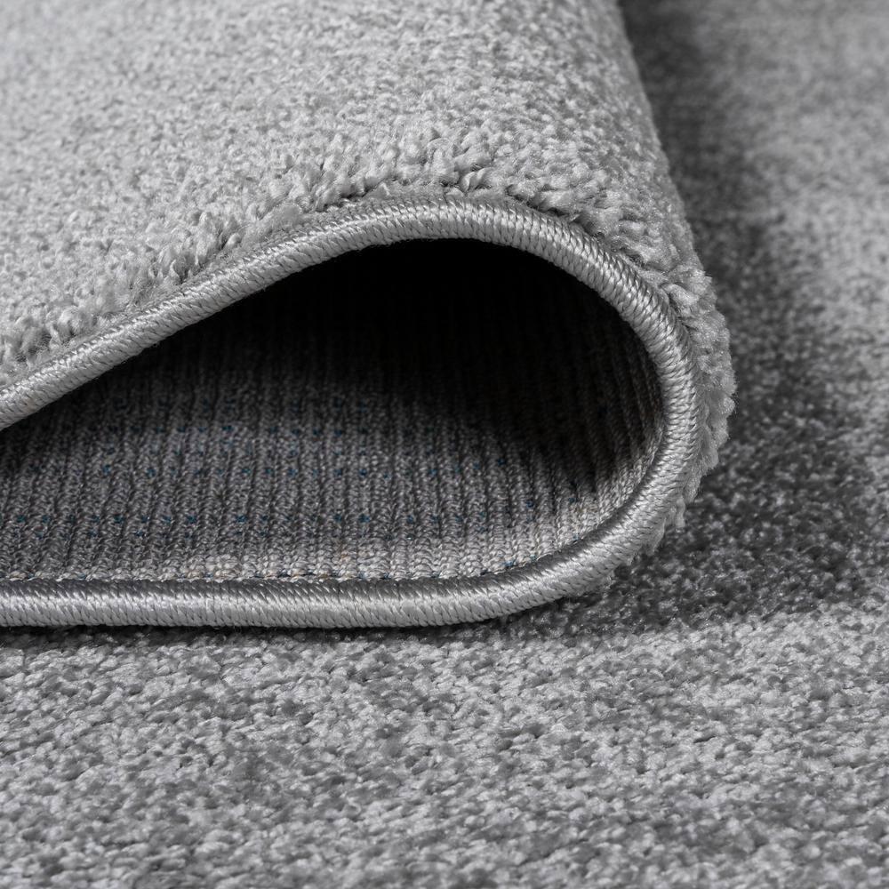 5'x8' Haze Solid Low-Pile Area Rug, Light Gray - JONATHAN Y
