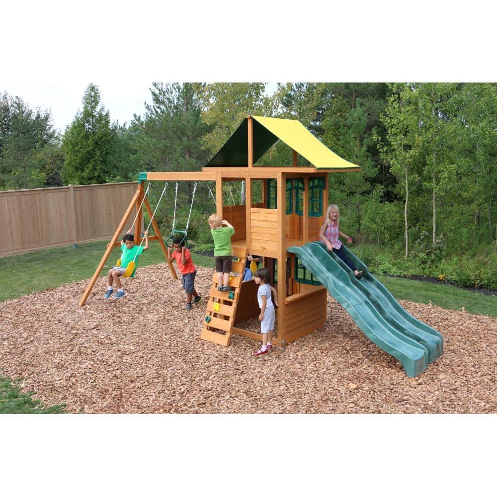 KidKraft Treasure Cove Wooden Swing Set with Slides and Rock Wall