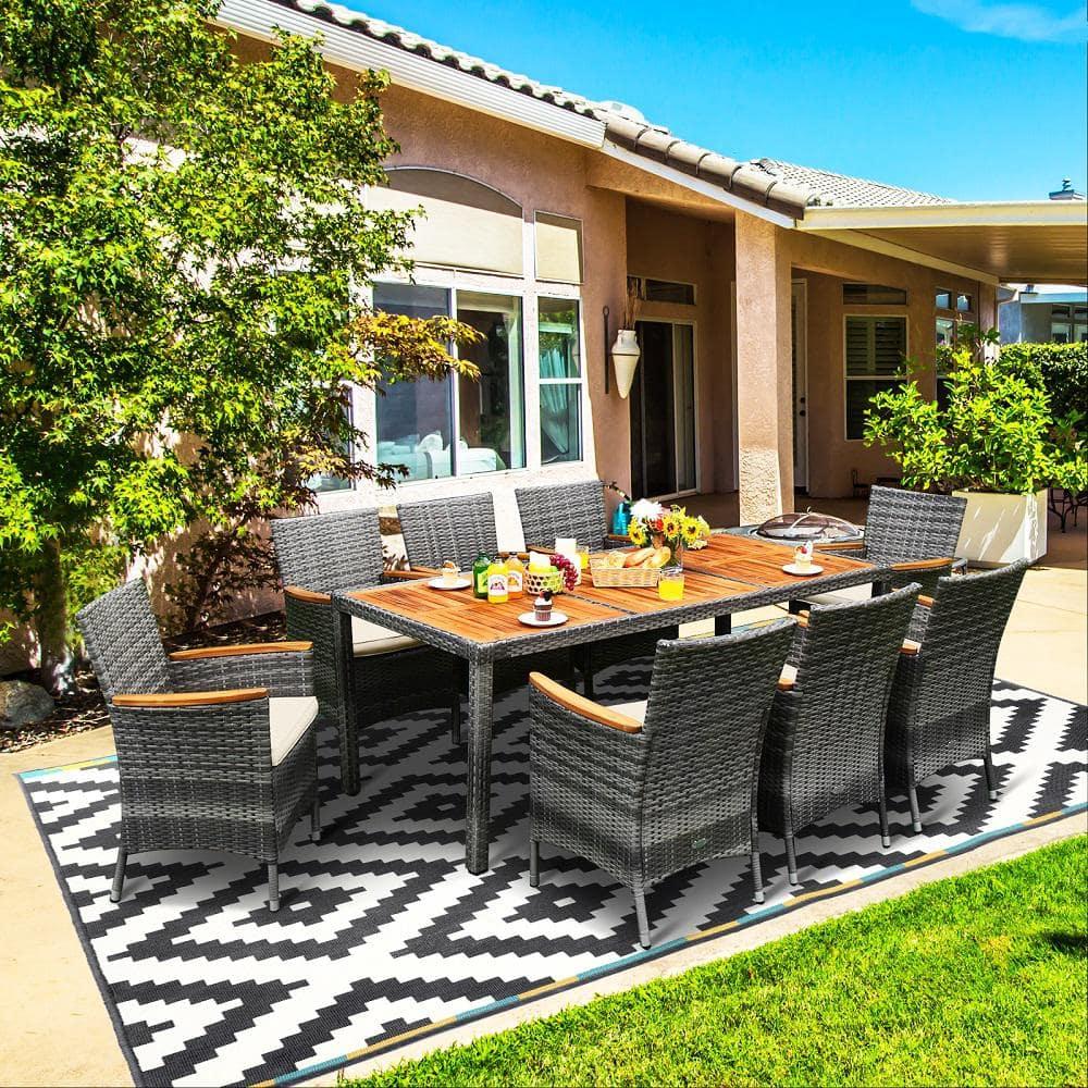 Costway 9 Pieces Outdoor Wicker Dining Set with Acacia Wood Table and 8 Armchairs