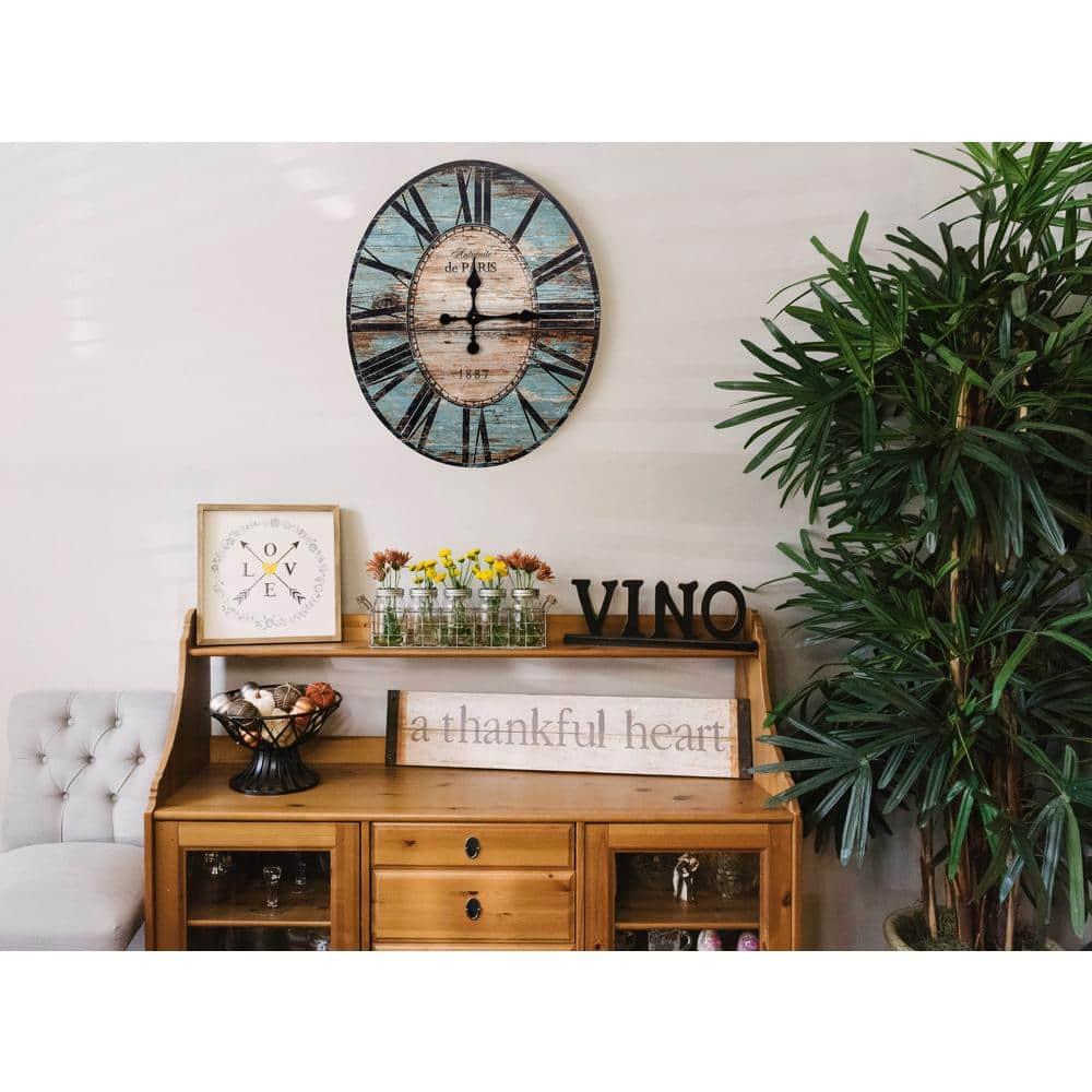 Woven Paths 29" Oval Turquoise Wood Wall Clock