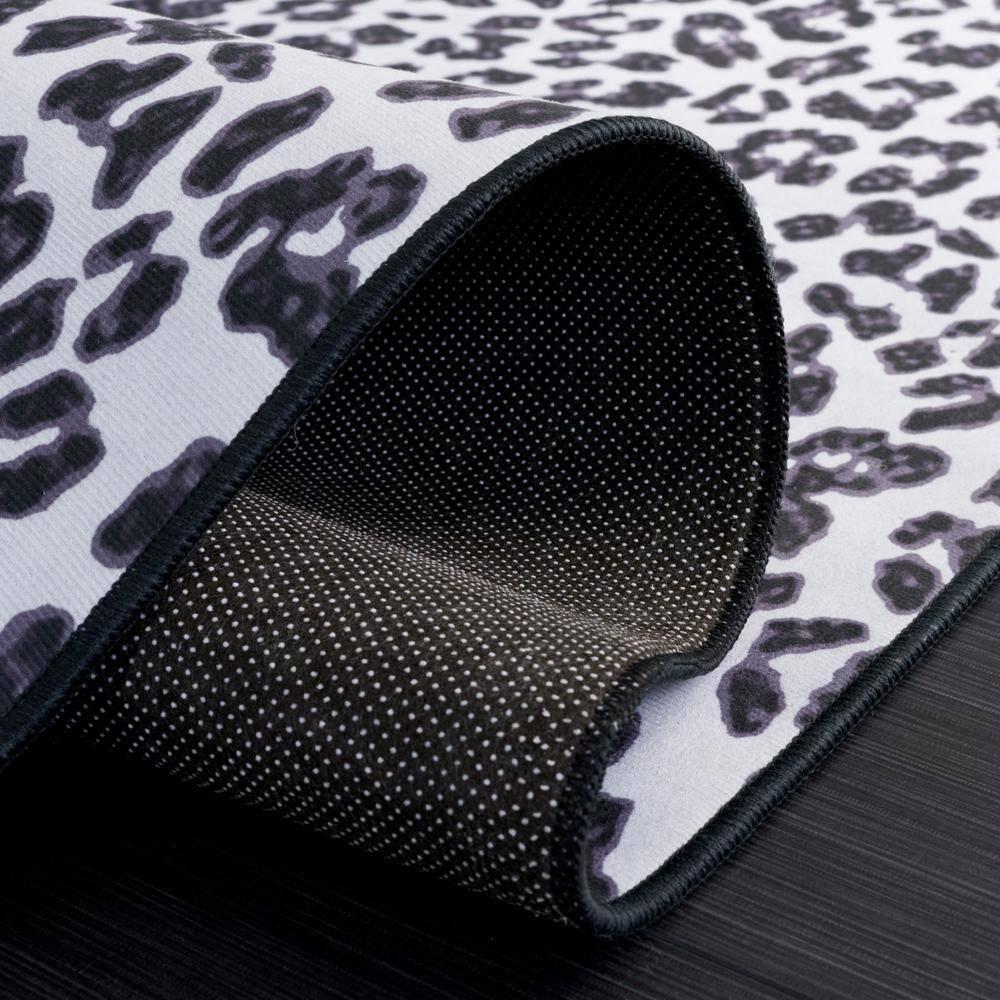 Everly Quinn Faux Hide Performance Machine Washable Animal Print Rug