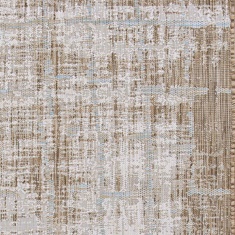 Couristan 5.25' x 7.5' Brown and Ivory Contemporary Rectangular Outdoor Area Throw Rug