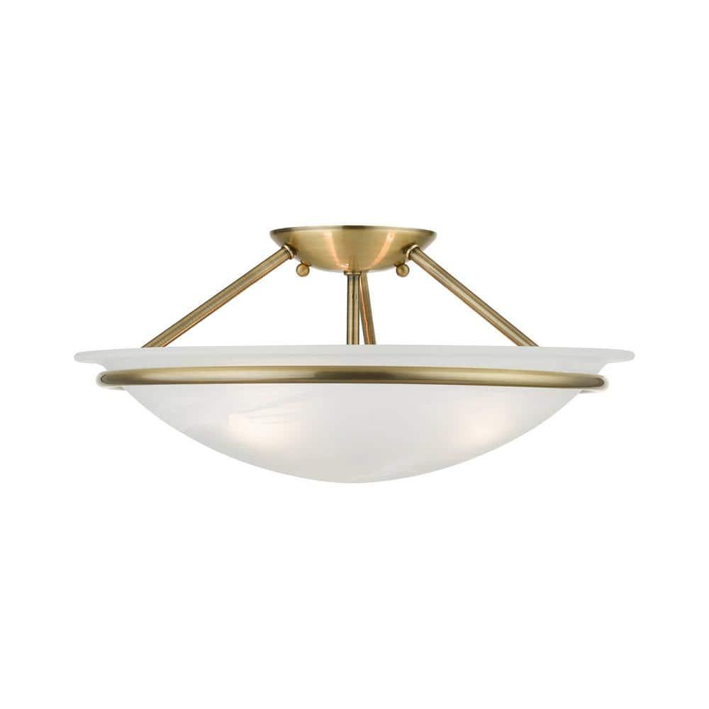 Livex Lighting Newburgh 3 - Light Semi-Flush Mount in Antique Brass