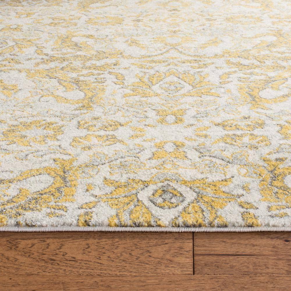 Evoke EVK238 Power Loomed Area Rug - Ivory/Gold - 6'7"x9' - Safavieh.
