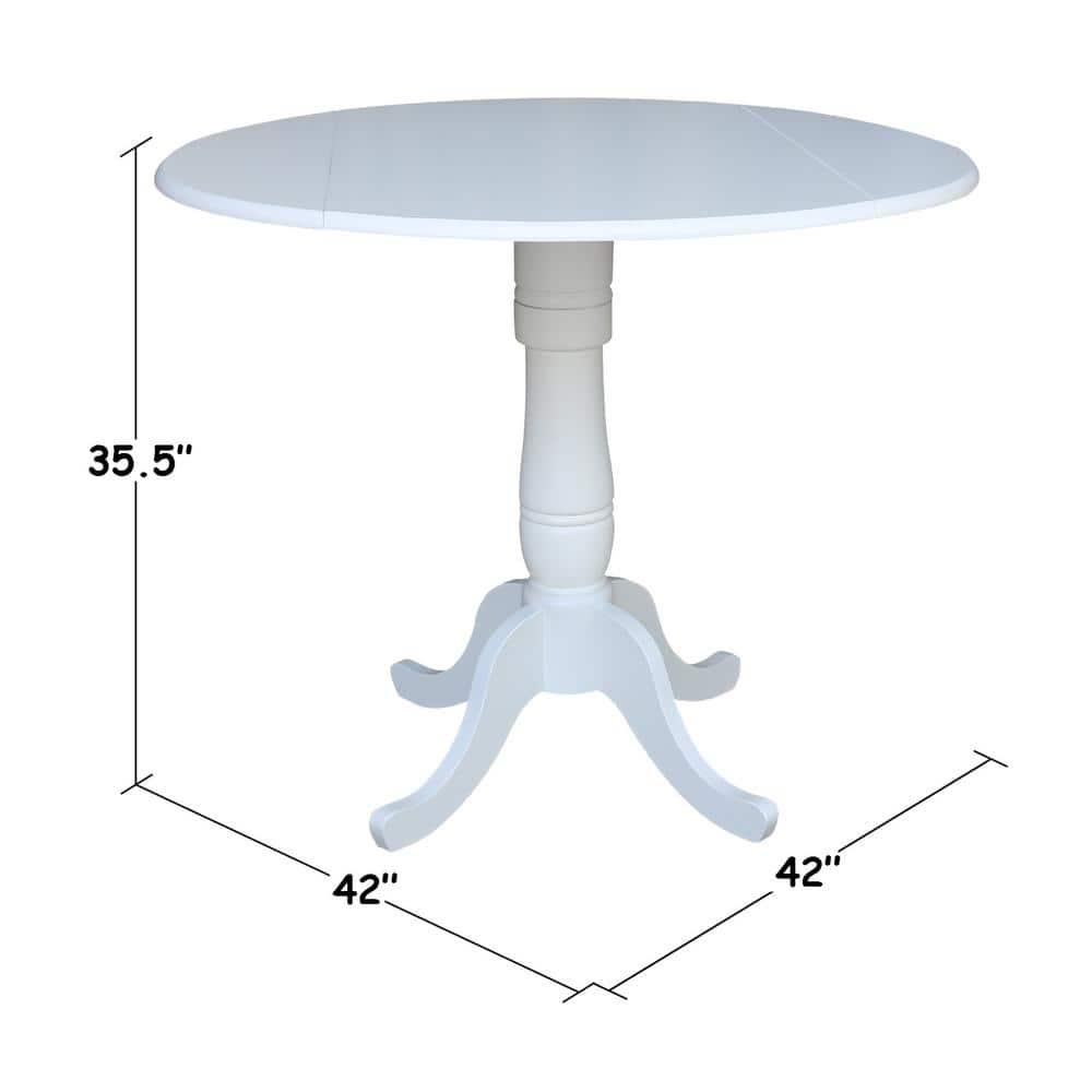 International Concepts 42 In Round dual drop Leaf Pedestal Table - 35.5  inchesH