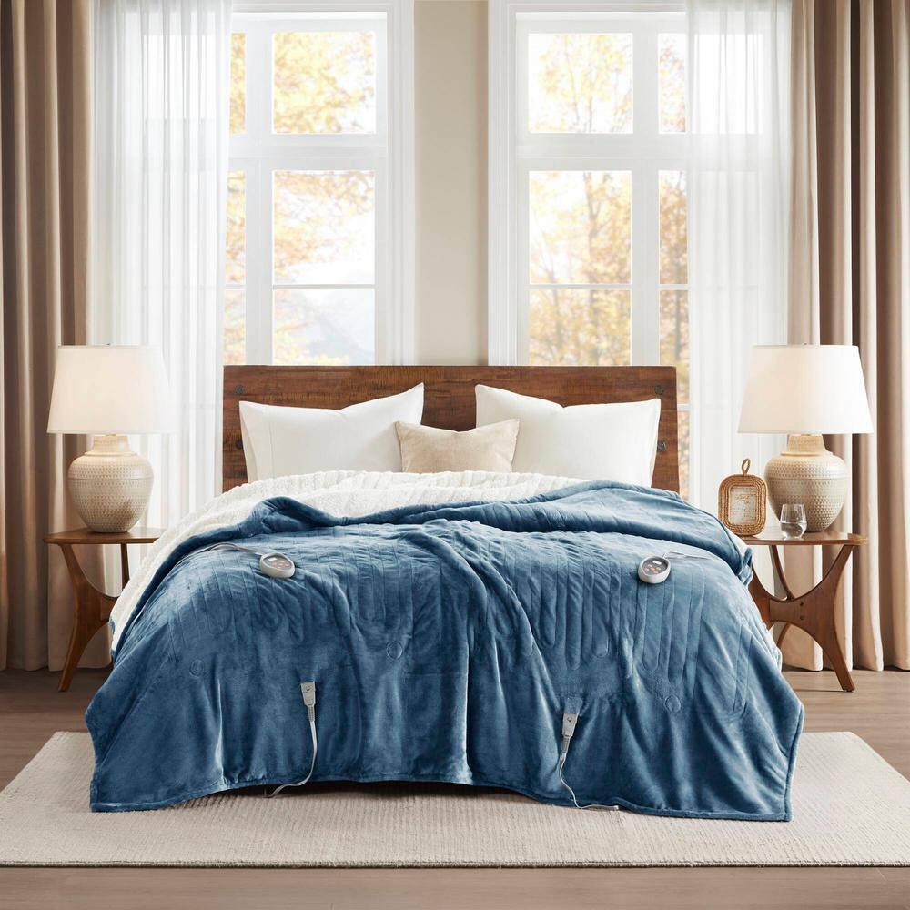 Woolrich Heated Plush to Berber Blanket