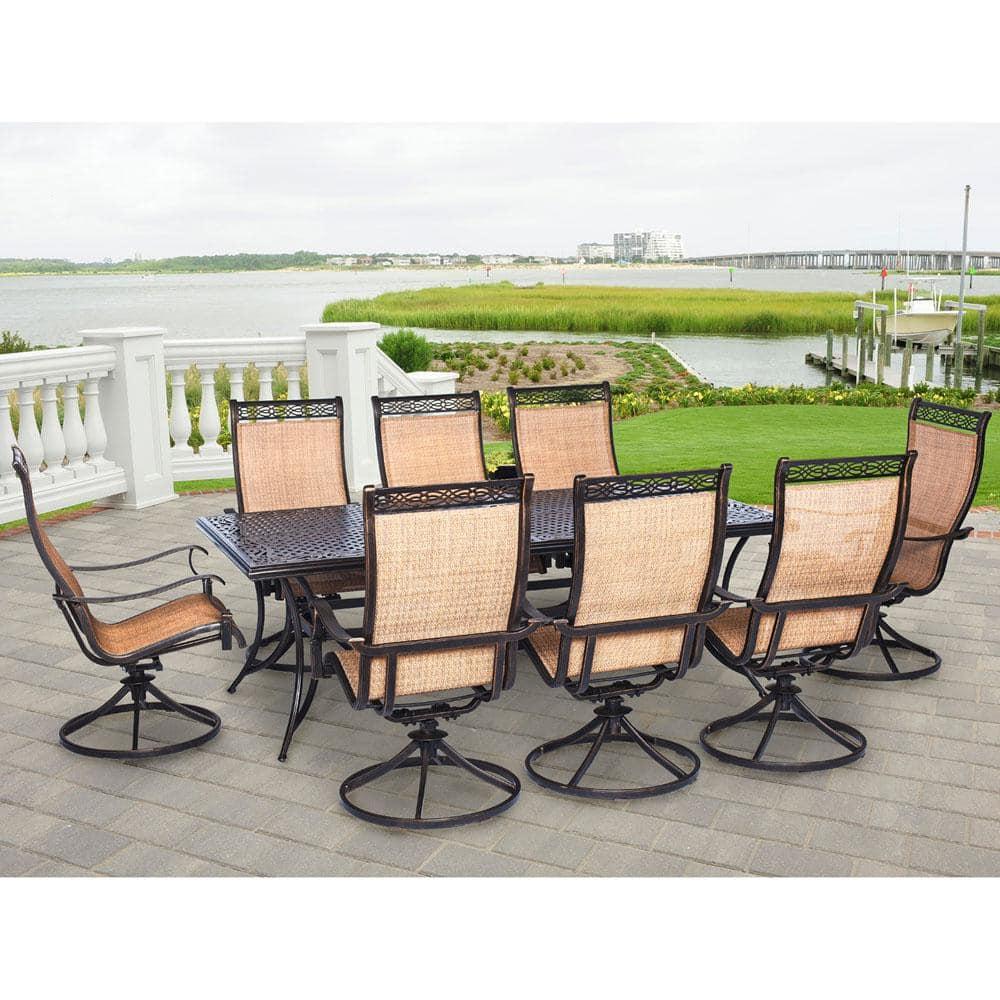 Hanover Outdoor Manor 9-Piece Outdoor Dining Set with 8 Swivel Rockers, Cedar/Bronze