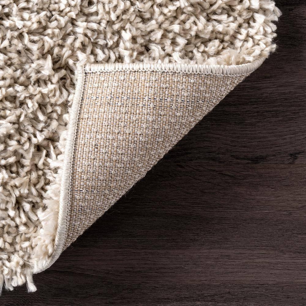 Nuloom Kara Solid 7x9 Shag Indoor Area Rug for Living Room Bedroom Dining Room Nursery, Beige