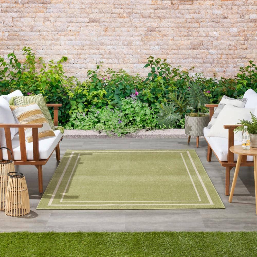Nourison Essentials Solid Bordered Low Pile Indoor Outdoor Area Rug 5' x 7' Green Ivory