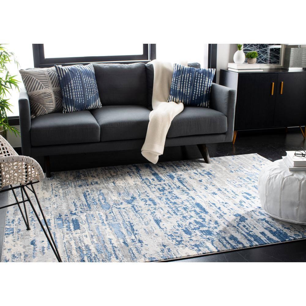 Jasper JSP107 Power Loomed Area Rug - Ivory/Blue - 8'x10' - Safavieh.