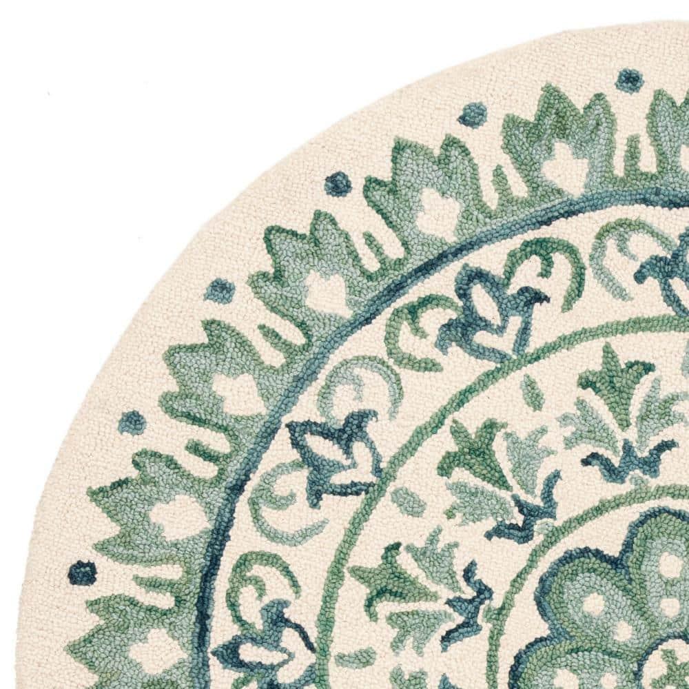 Novelty NOV607 Hand Tufted Area Rug - Ivory/Teal - 6' Round - Safavieh.