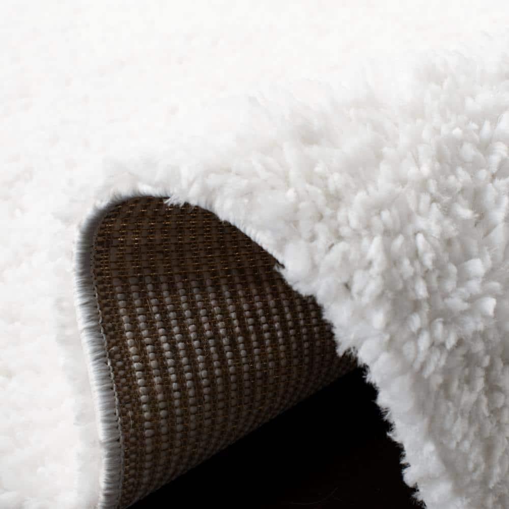 SAFAVIEH August Carlene Solid Plush Shag Area Rug, White, 9' x 12'