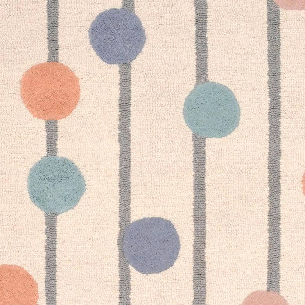 Safavieh Kids Confetti SFK909 Hand Tufted Indoor Accent Rug - Ivory/Multi - 4'x6' - Safavieh