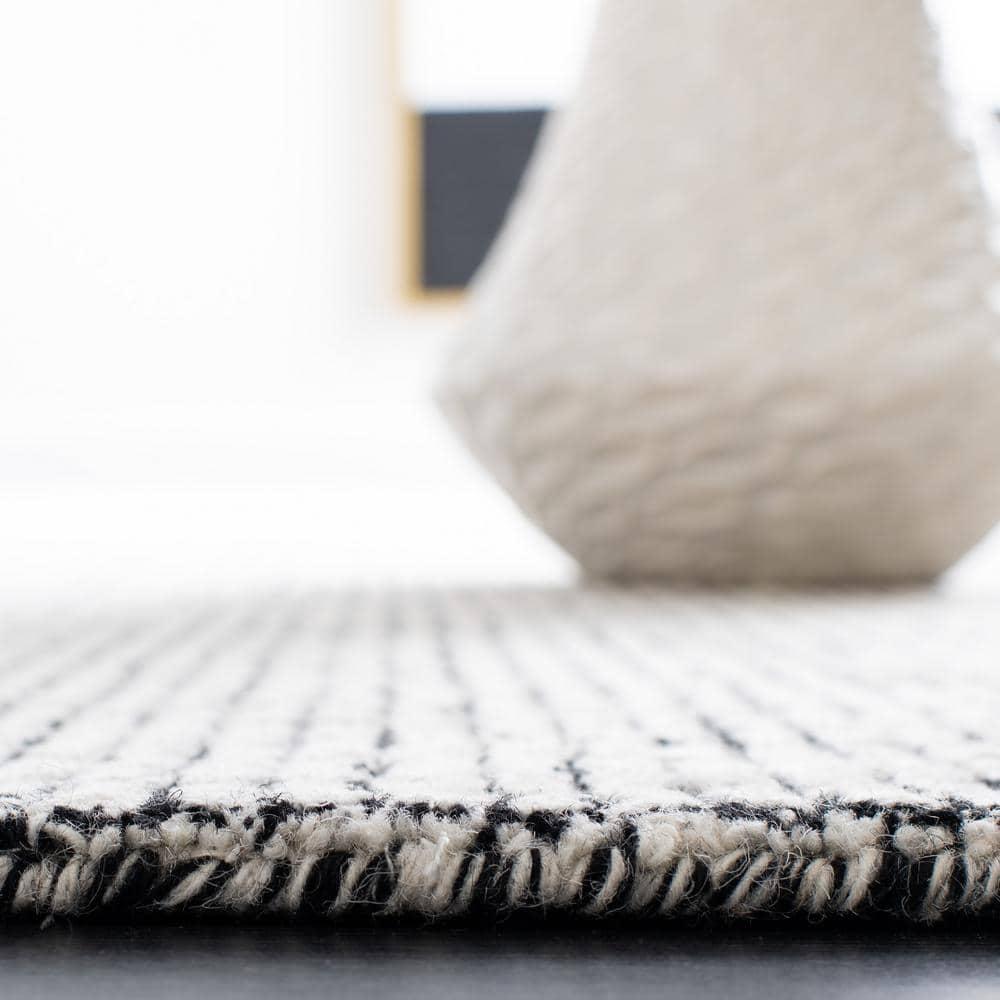 SAFAVIEH Abstract Dalia Geometric Area Rug, Ivory/Black, 4' x 4' Round