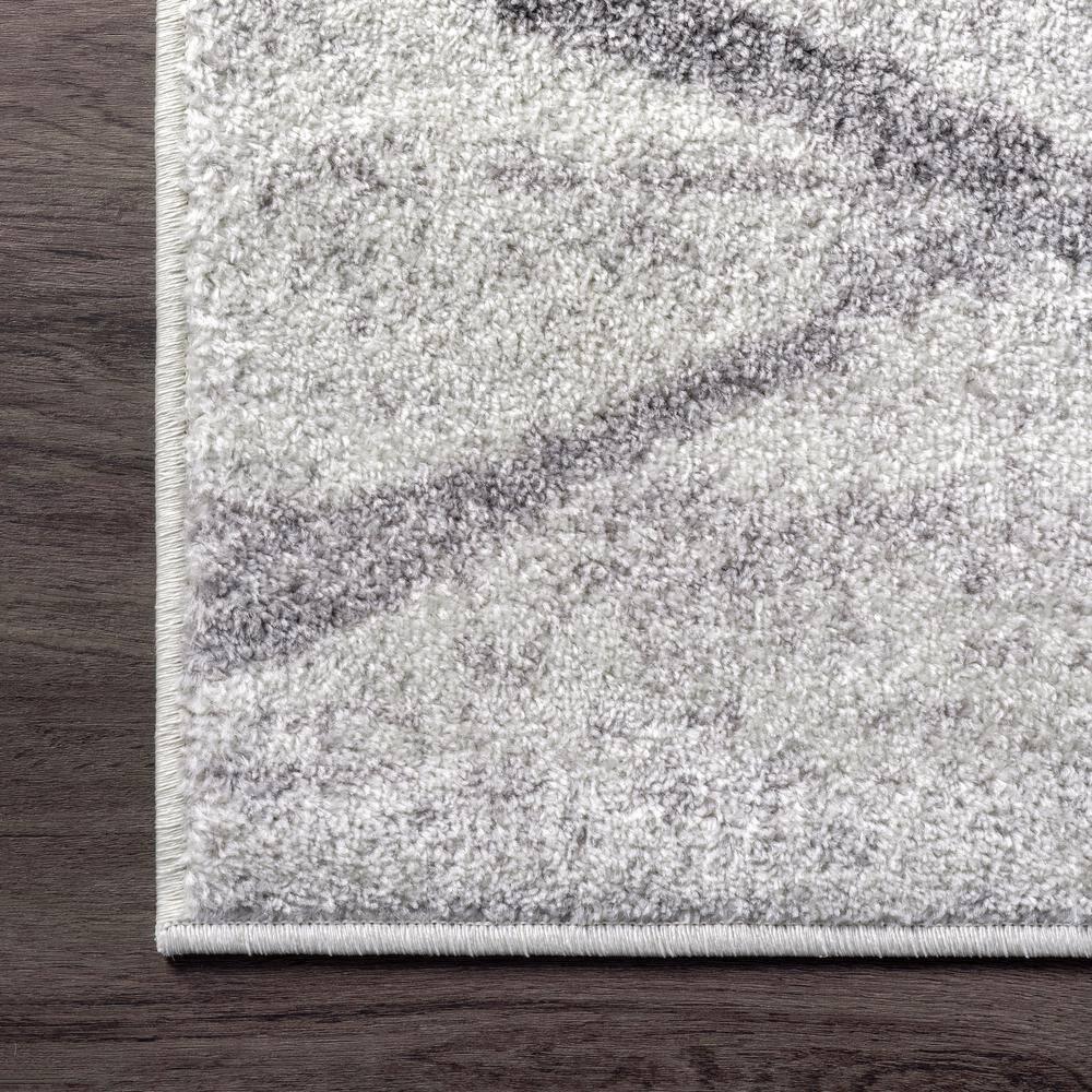 Gray Oval Reversible Stain-Resistant Synthetic Area Rug