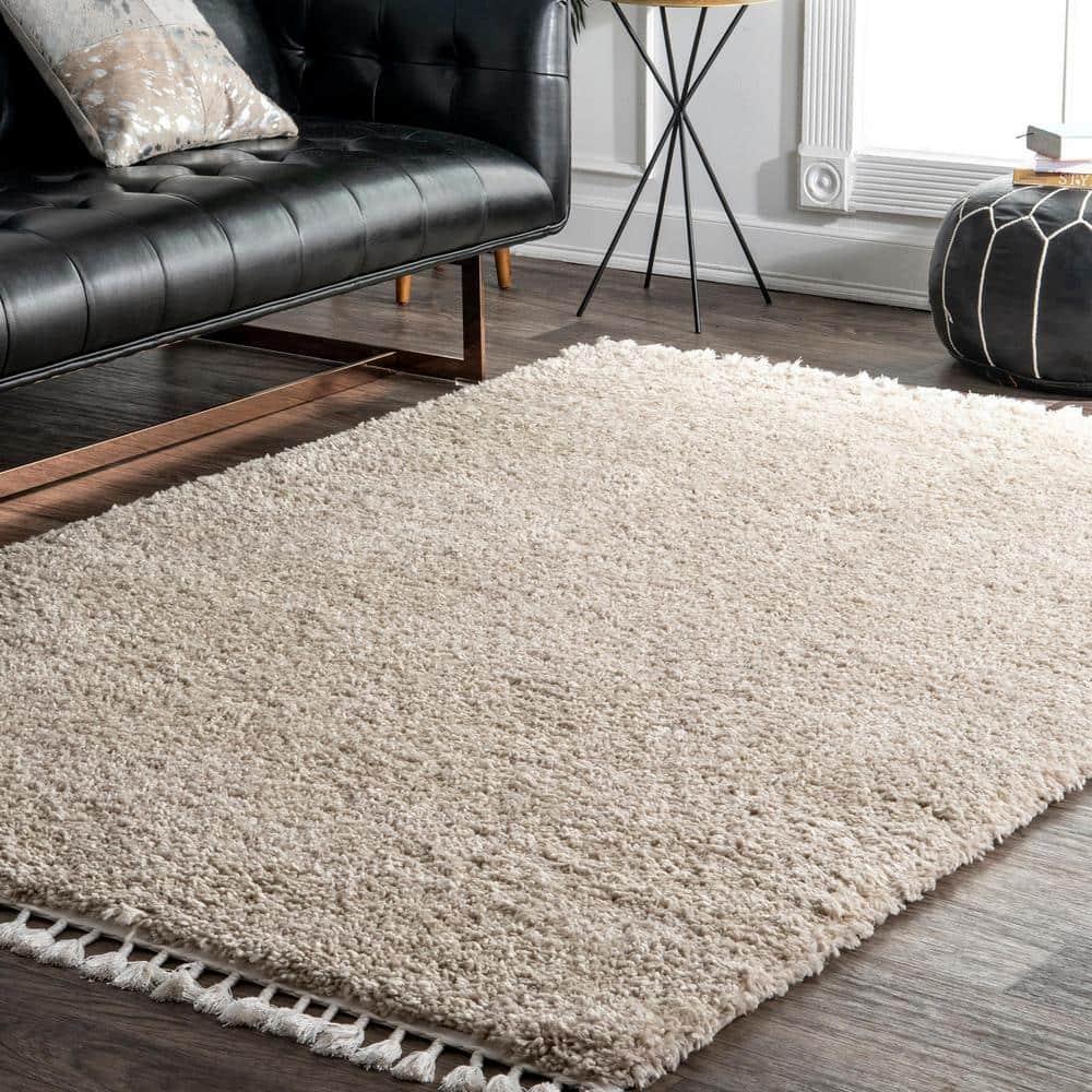 Nuloom Neva Solid 7x9 Shag Indoor Area Rug for Living Room Bedroom Dining Room Nursery, Beige/Ivory