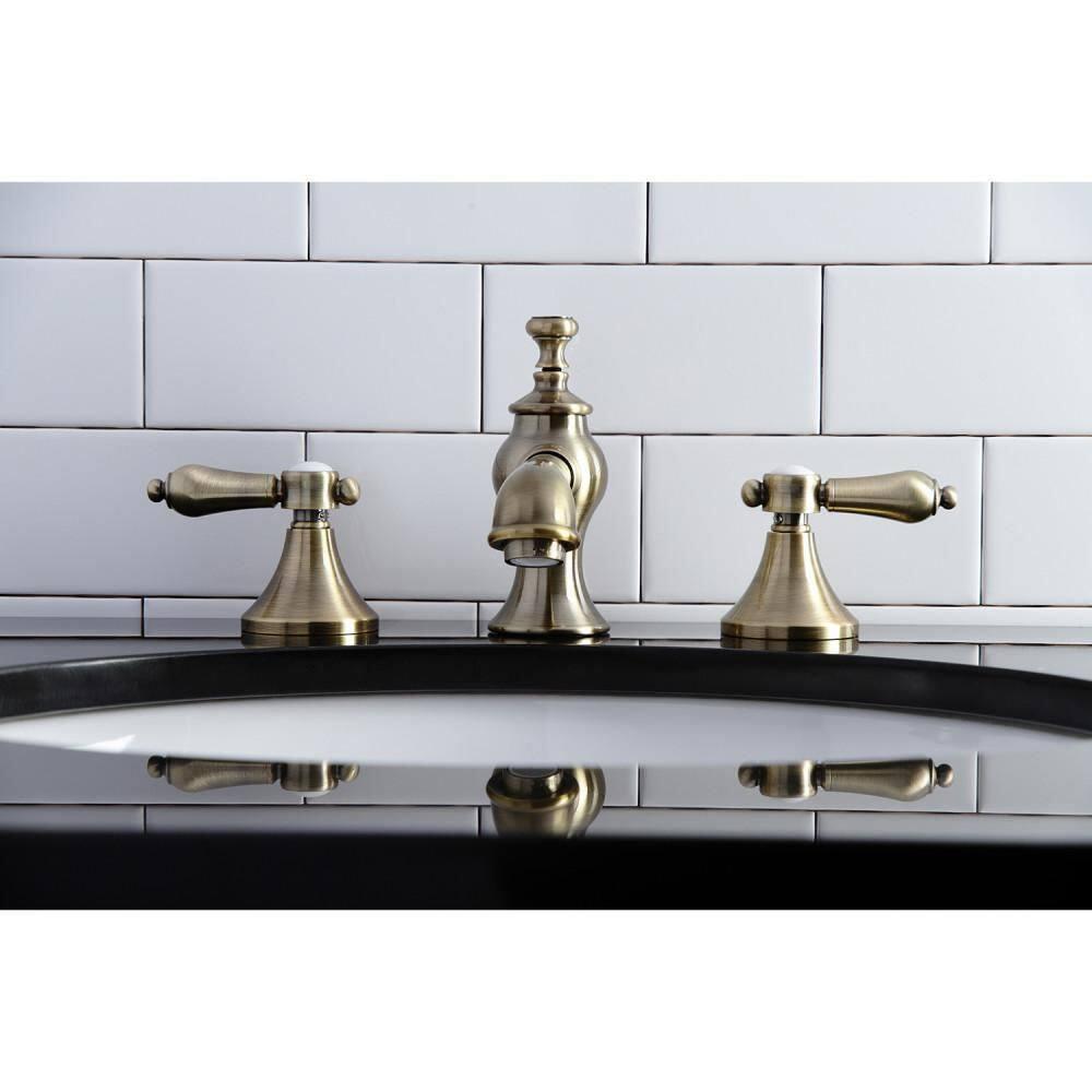 Kingston Brass Vintage Two-Handle 3-Hole Deck Mount Widespread Bathroom Faucet with Brass Pop-Up Drain