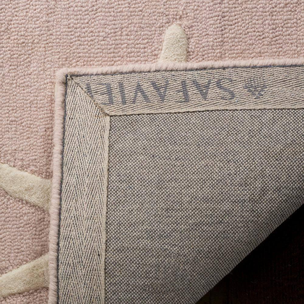 Safavieh Kids SFK908 Hand Tufted Area Rug - Pink/Ivory - 5' round - Safavieh.