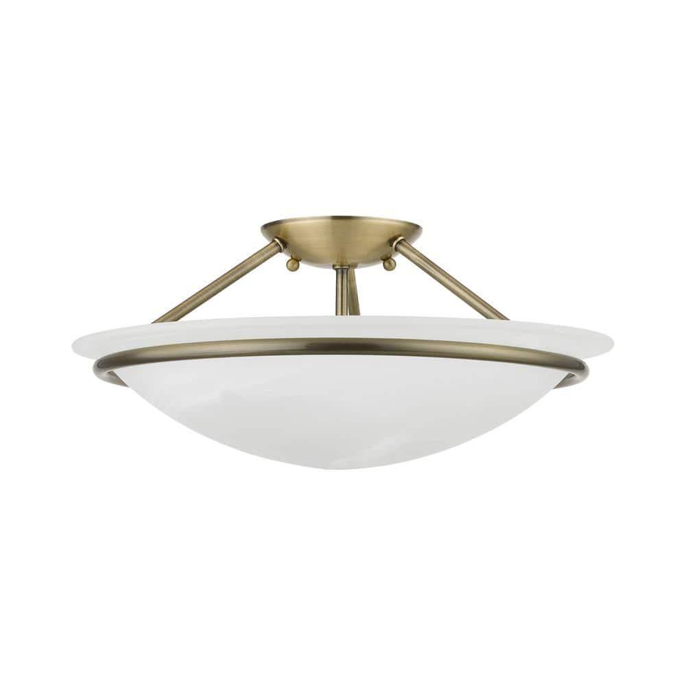 Livex Lighting Newburgh 3 - Light Semi-Flush Mount in Antique Brass