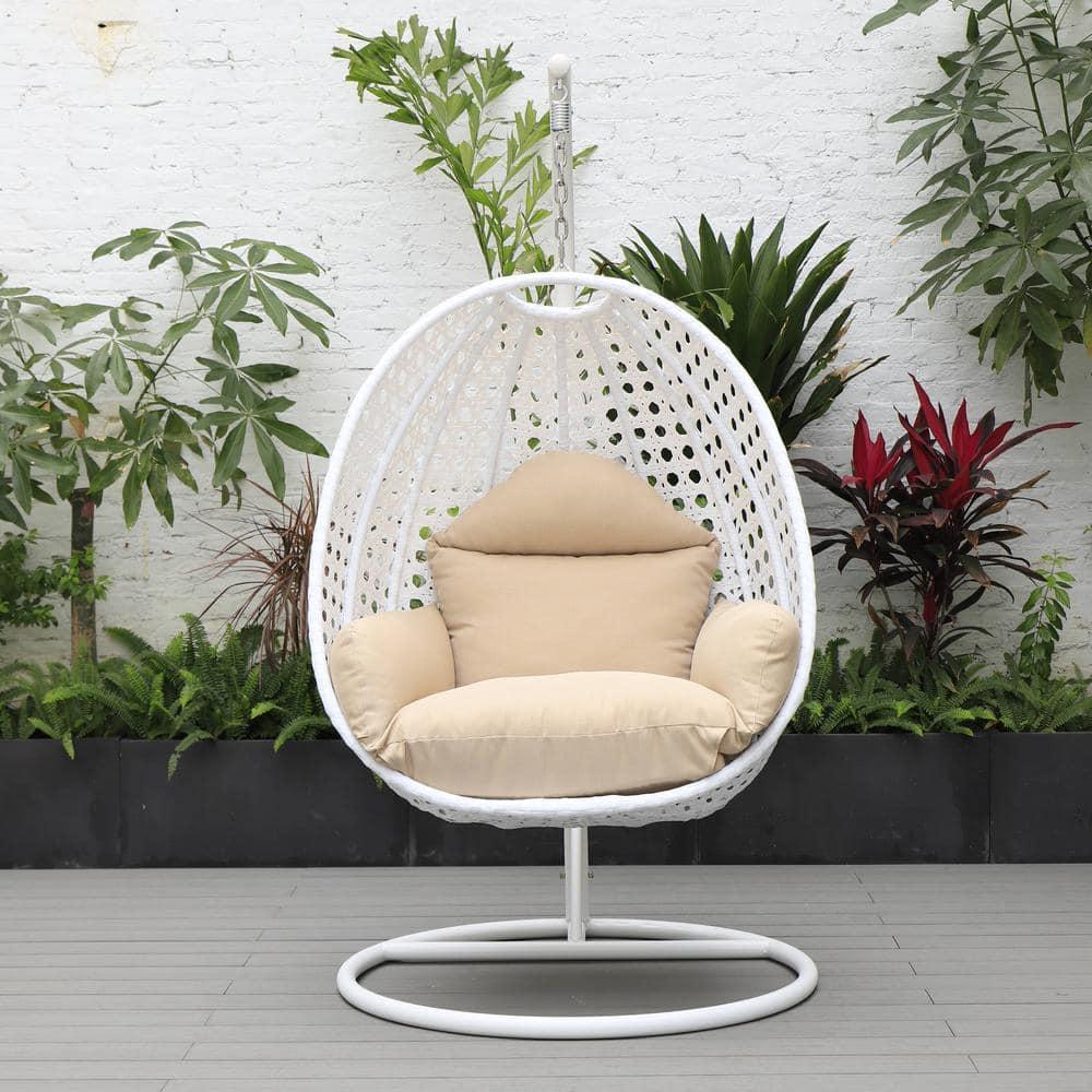 LeisureMod White Wicker Indoor Outdoor Bedroom Patio Hanging Egg Swing Chair with Stand and Cushion Beige
