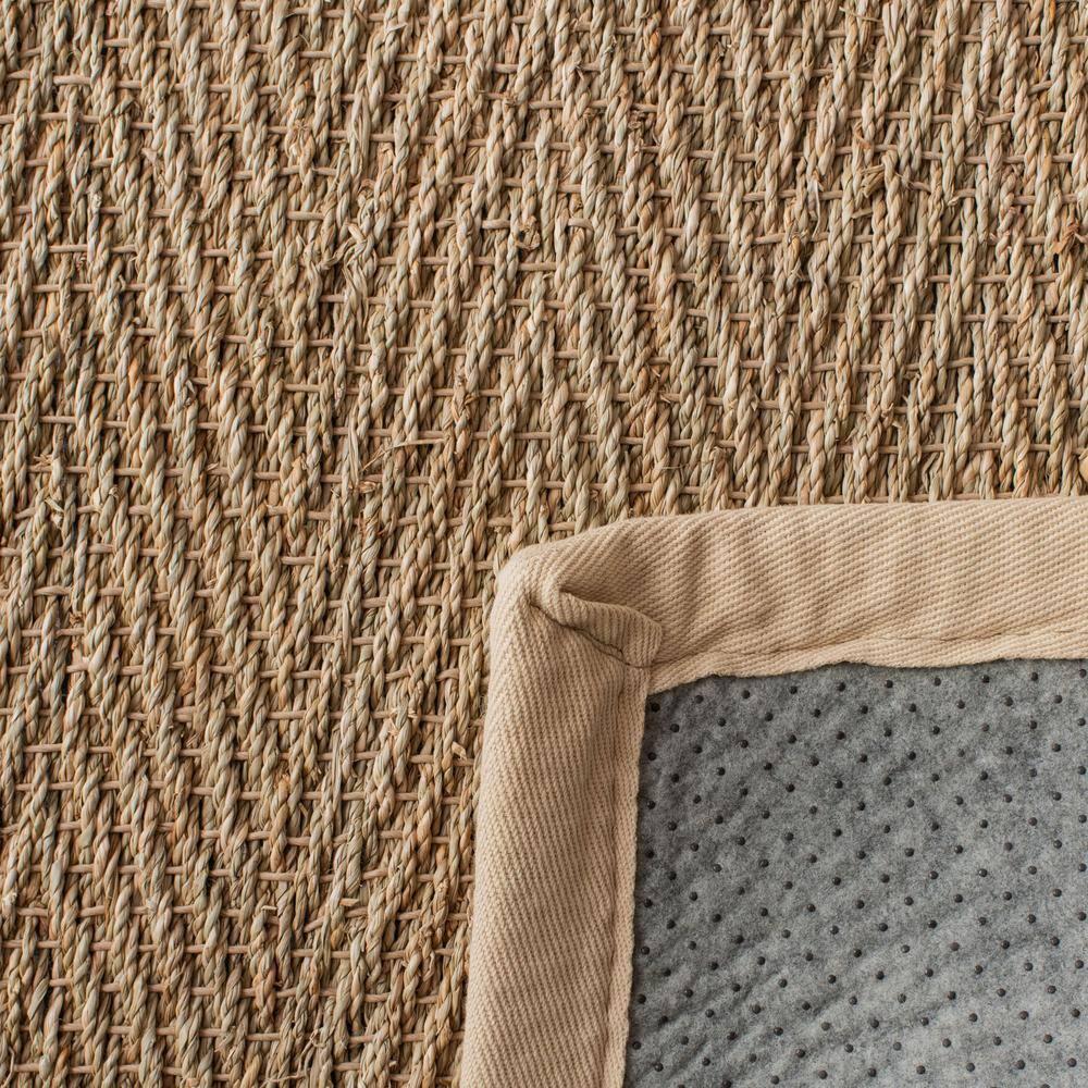 Deschamps Natural Fiber Seagrass Solid Color Rug
