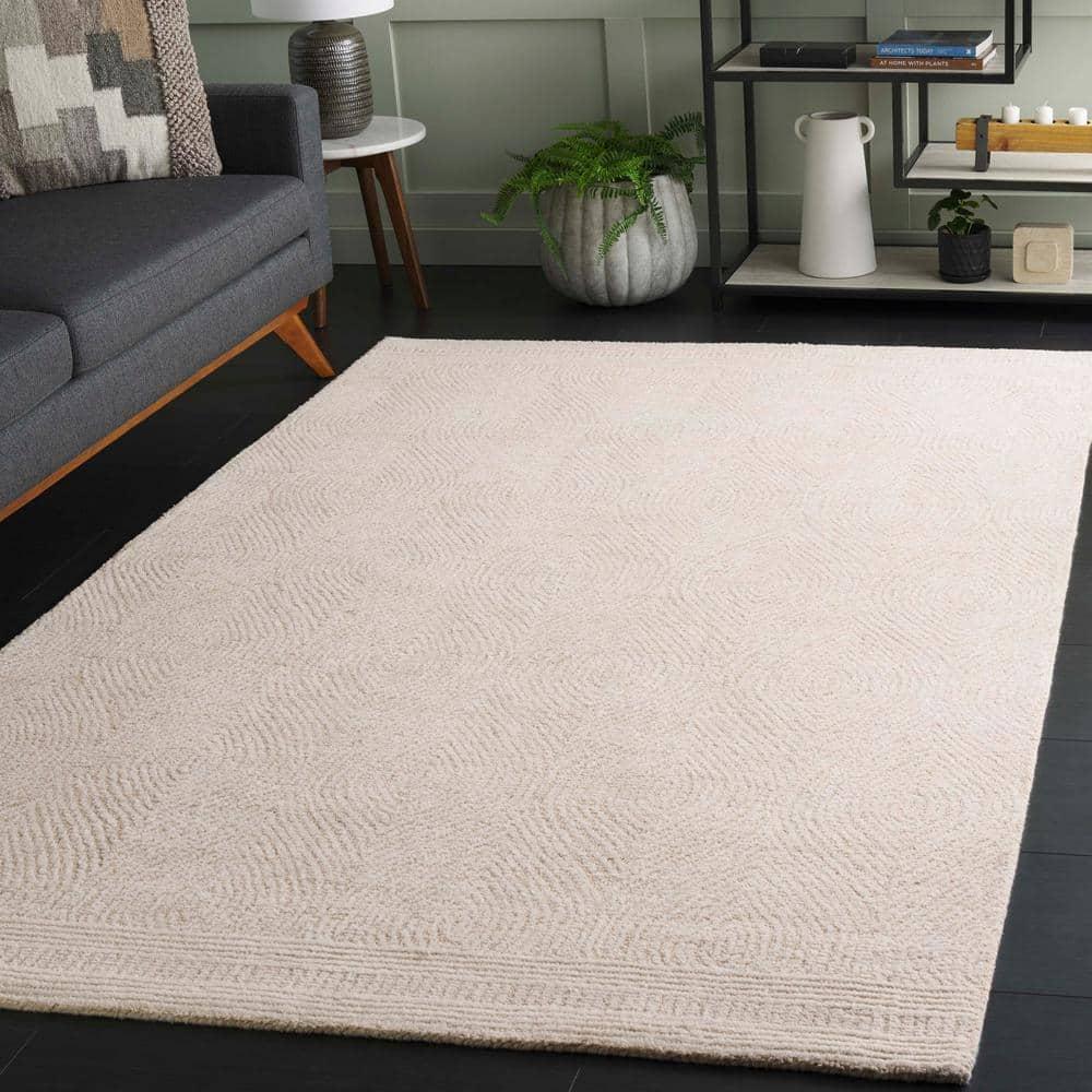 Ivory and Beige 6' x 9' Handmade Wool Abstract Area Rug