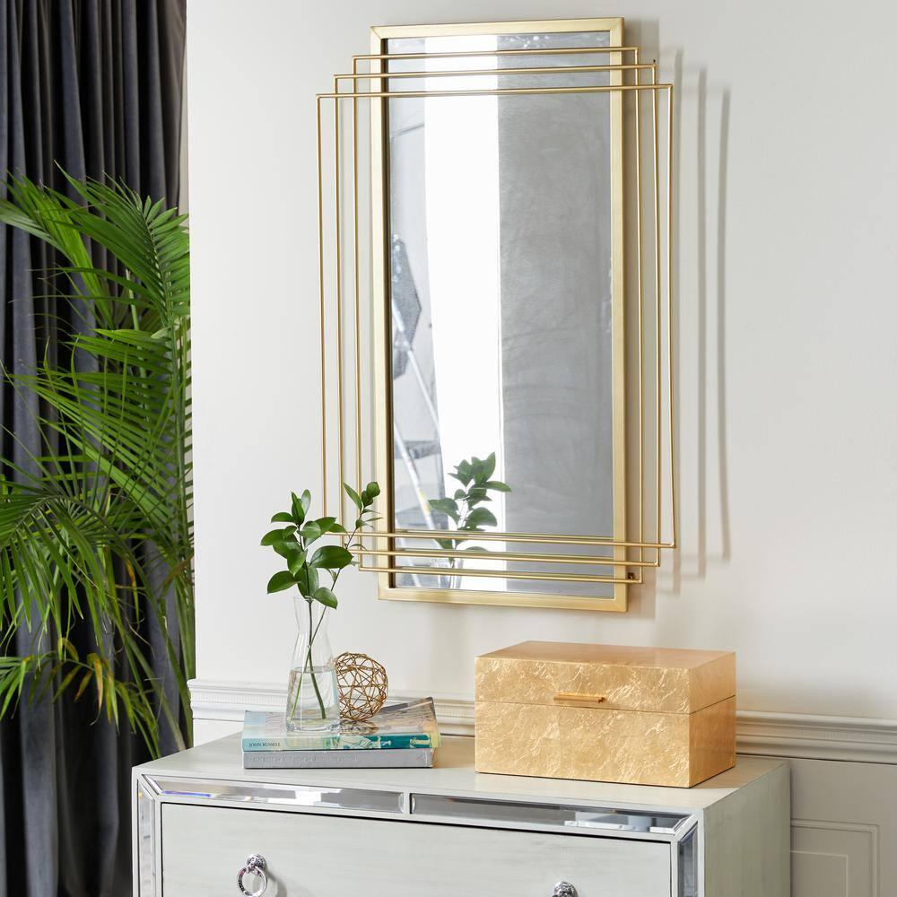 CosmoLiving by Cosmopolitan CosmoLiving by Cosmopolitan Gold Metal Geometric Wall Mirror
