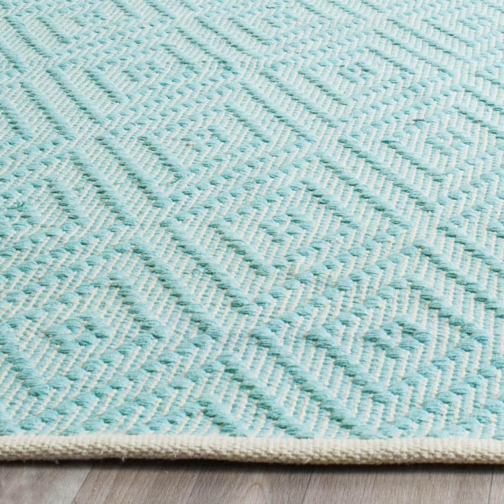 Montauk MTK811 Hand Woven Indoor Area Rug - Turquoise/Ivory - 5'x7' - Safavieh.