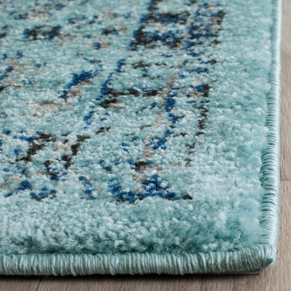SAFAVIEH Evoke Teale Traditional Bordered Area Rug, Light Blue, 9' x 12'