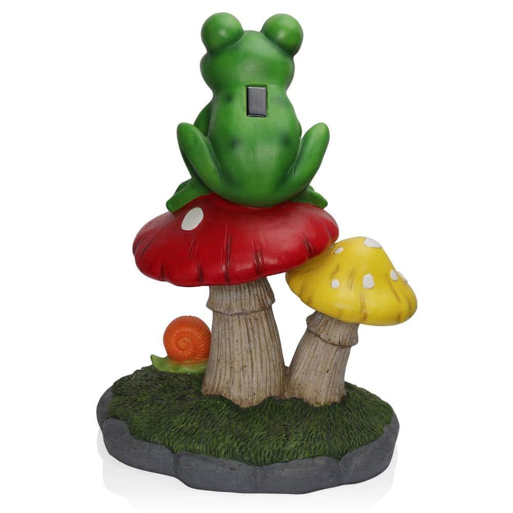 Solar Frog Sitting On Top of Mushroom Statue