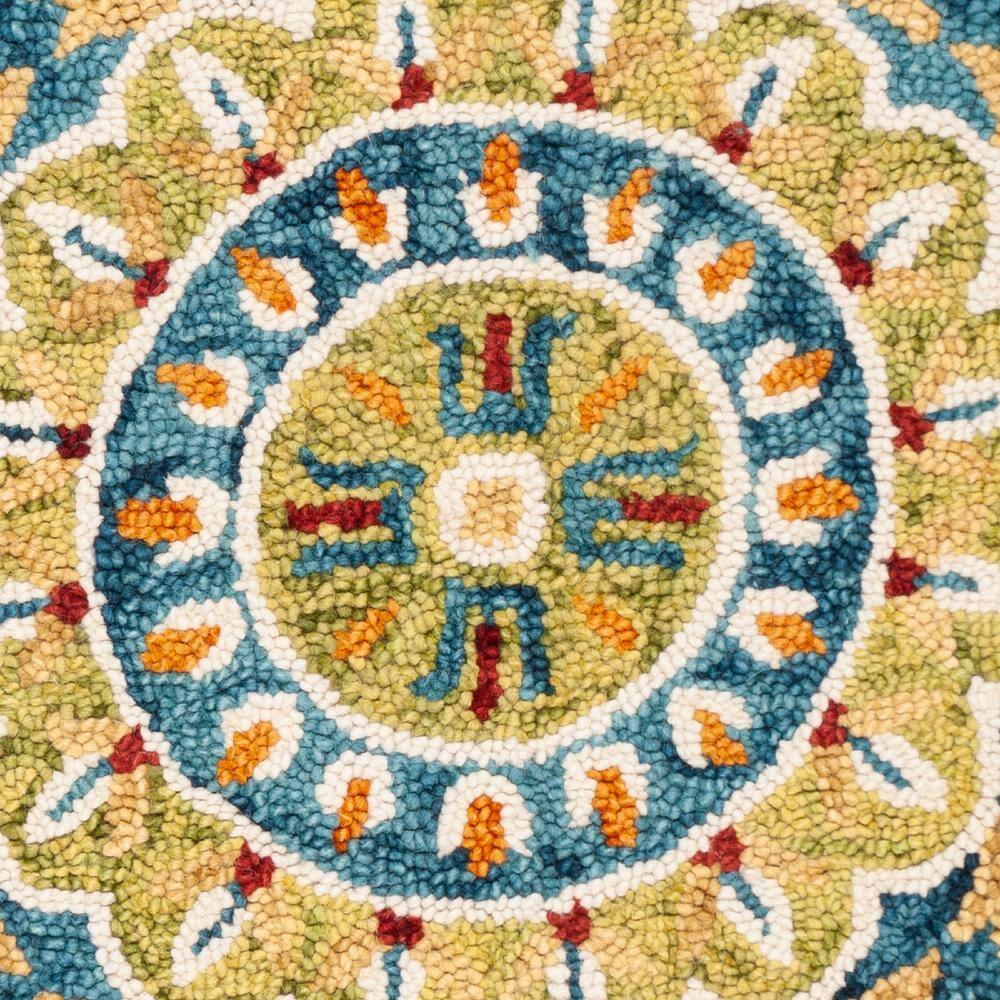 Novelty NOV605 Hand Tufted Area Rug - Ivory/Blue - 4' round - Safavieh.