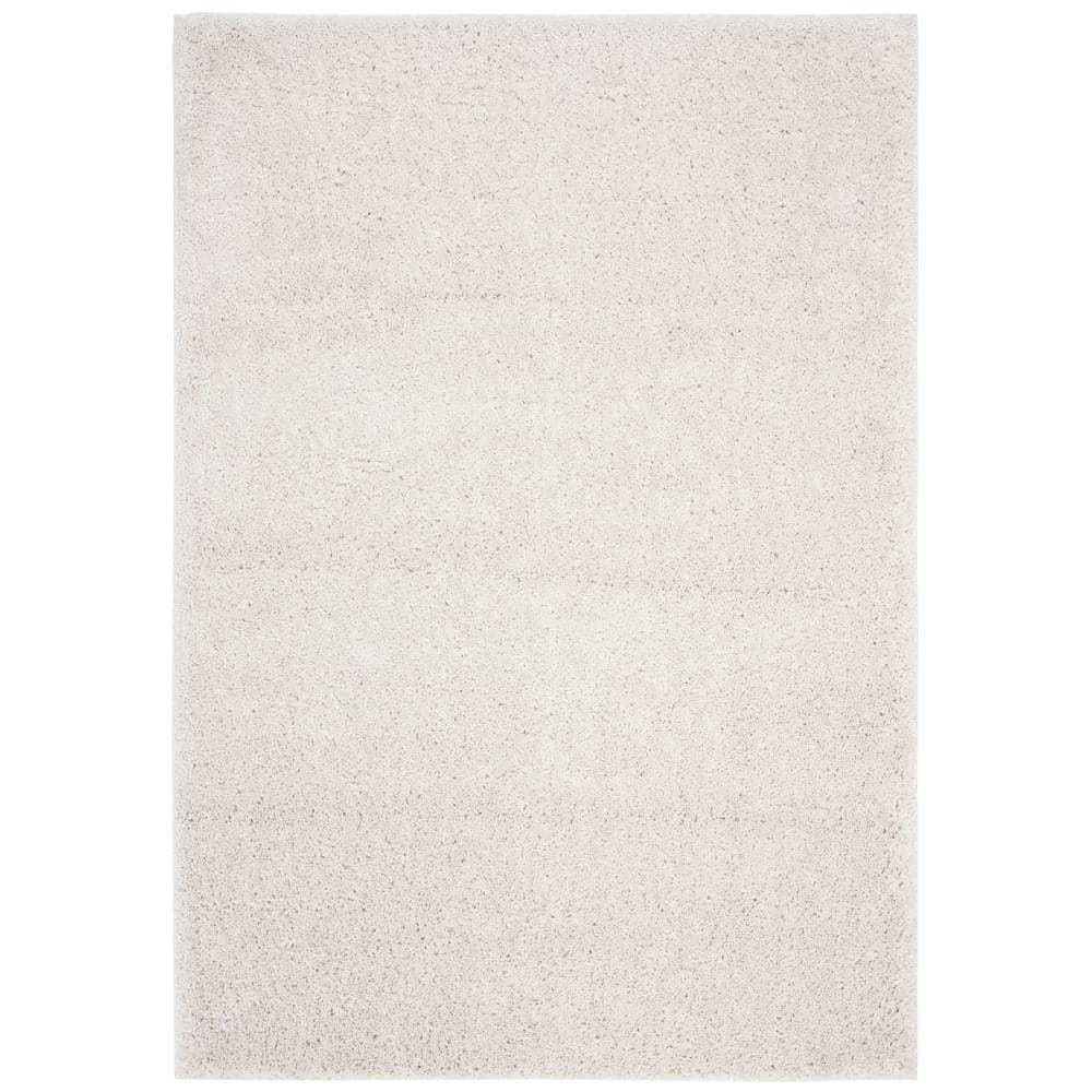 SAFAVIEH August Carlene Solid Plush Shag Area Rug, Beige, 9' x 12'