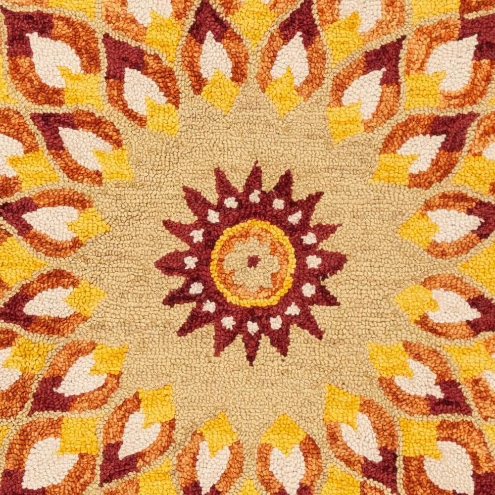 Novelty NOV603 Hand Tufted Area Rug - Rust/Gold - 5' round - Safavieh.