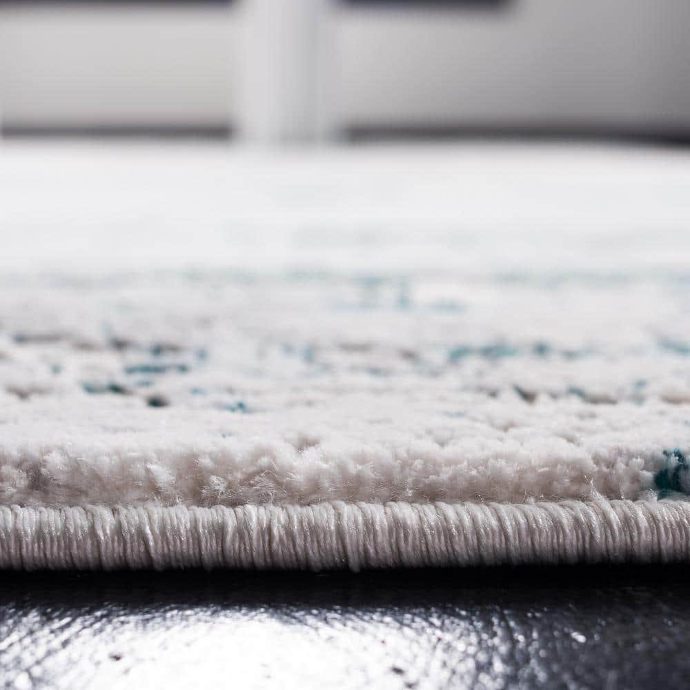 Amalfi AMF572 Power Loomed Area Rug - Cream/Turquoise - 5'3"x7'6" - Safavieh.