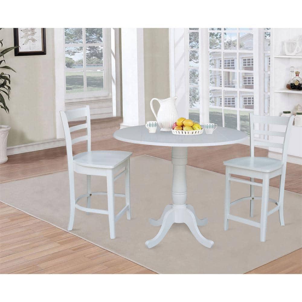 International Concepts 42 In Round dual drop Leaf Pedestal Table - 35.5  inchesH