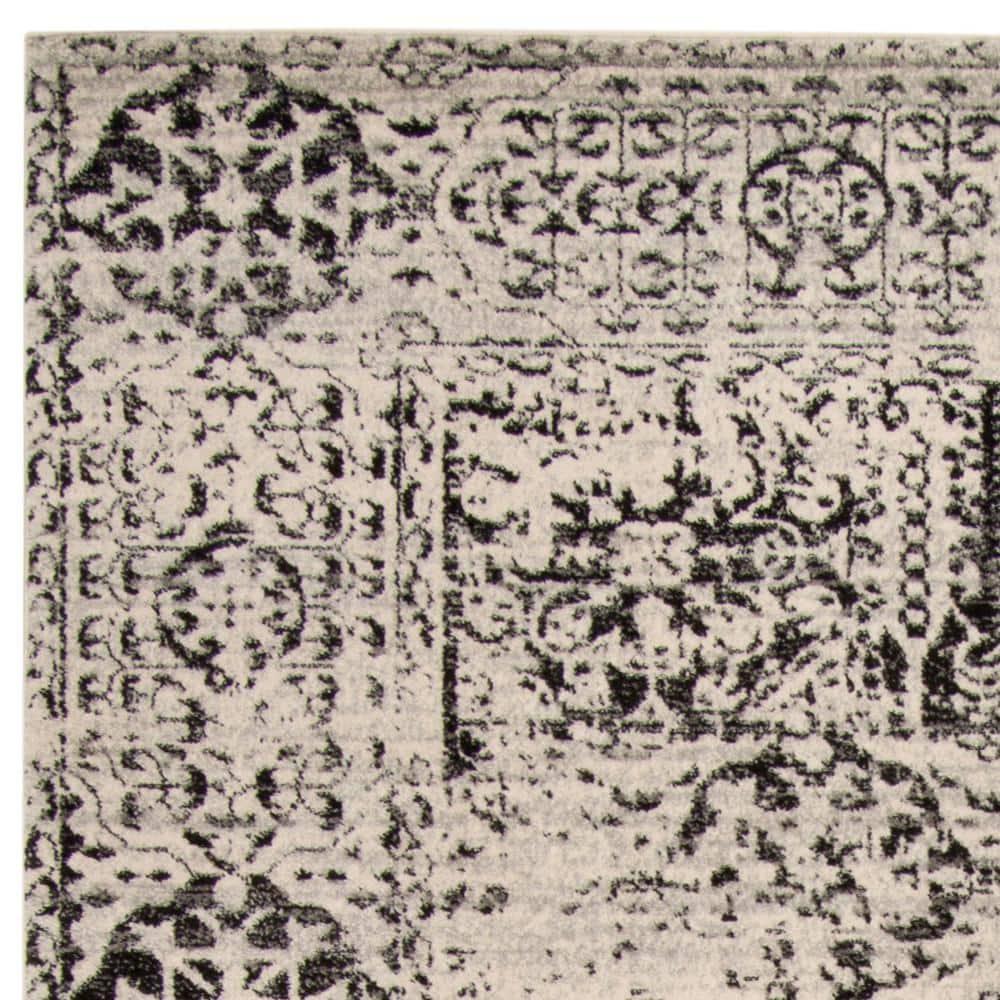 Evoke EVK260 Power Loomed Area Rug Ivory / Black 8' X 10' - Safavieh.