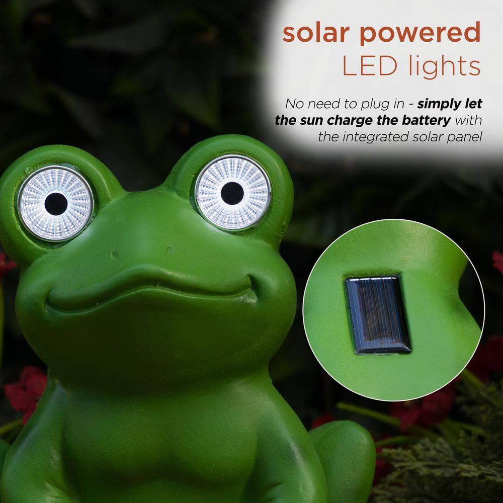 Solar Frog Sitting On Top of Mushroom Statue