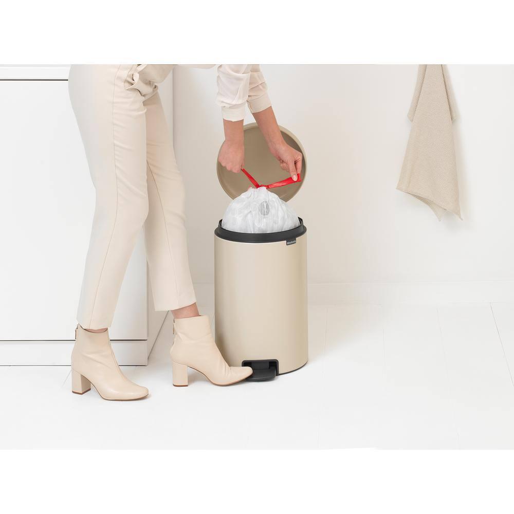 Soft Beige Round Plastic Step-On Kitchen Trash Can, 5.3 Gallons