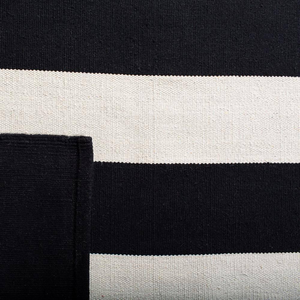 Montauk MTK712 Hand Woven Area Rug - Black/Ivory - 4' round - Safavieh.