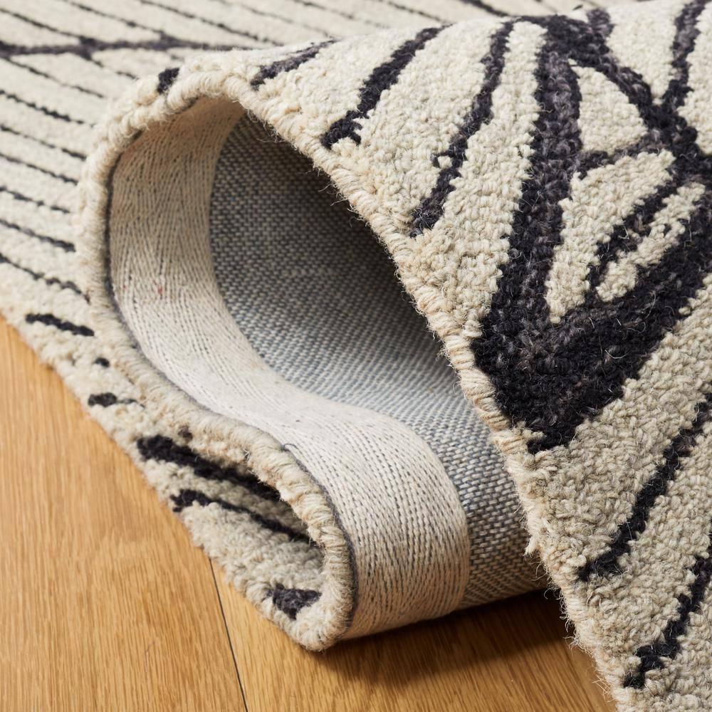 Metro MET451 Hand Tufted Indoor Area Rug - Black/Ivory - 8'x10' - Safavieh