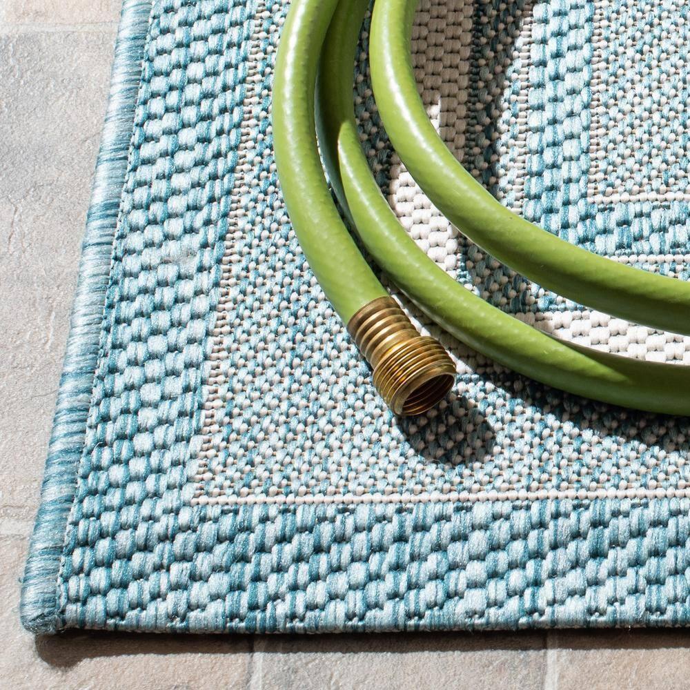 SAFAVIEH Courtyard Ercan Bordered Indoor/Outdoor Area Rug, Ivory/Aqua, 4' x 5'7"