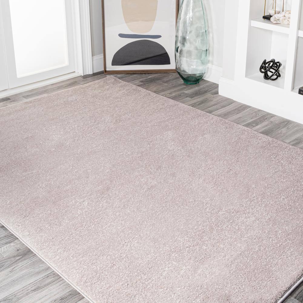 8'x10' Haze Solid Low-Pile Area Rug, Beige - JONATHAN Y