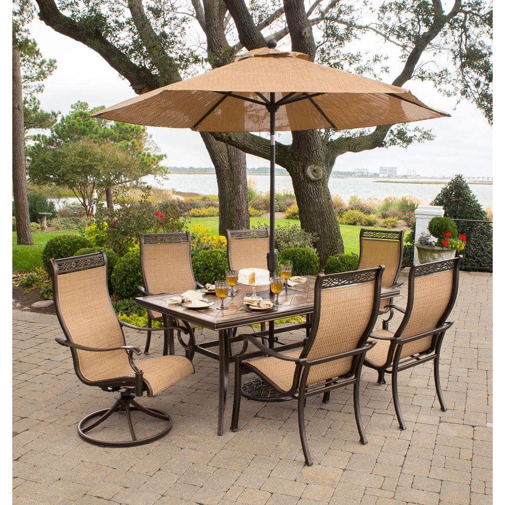 Hanover Monaco 7-Piece Outdoor Patio Dining Set with 4 PVC Sling Dining Chairs, 2 Swivel Rockers, and 40" x 68" Porcelain Tile Rectangular Dining Table | MONACO7PCSW