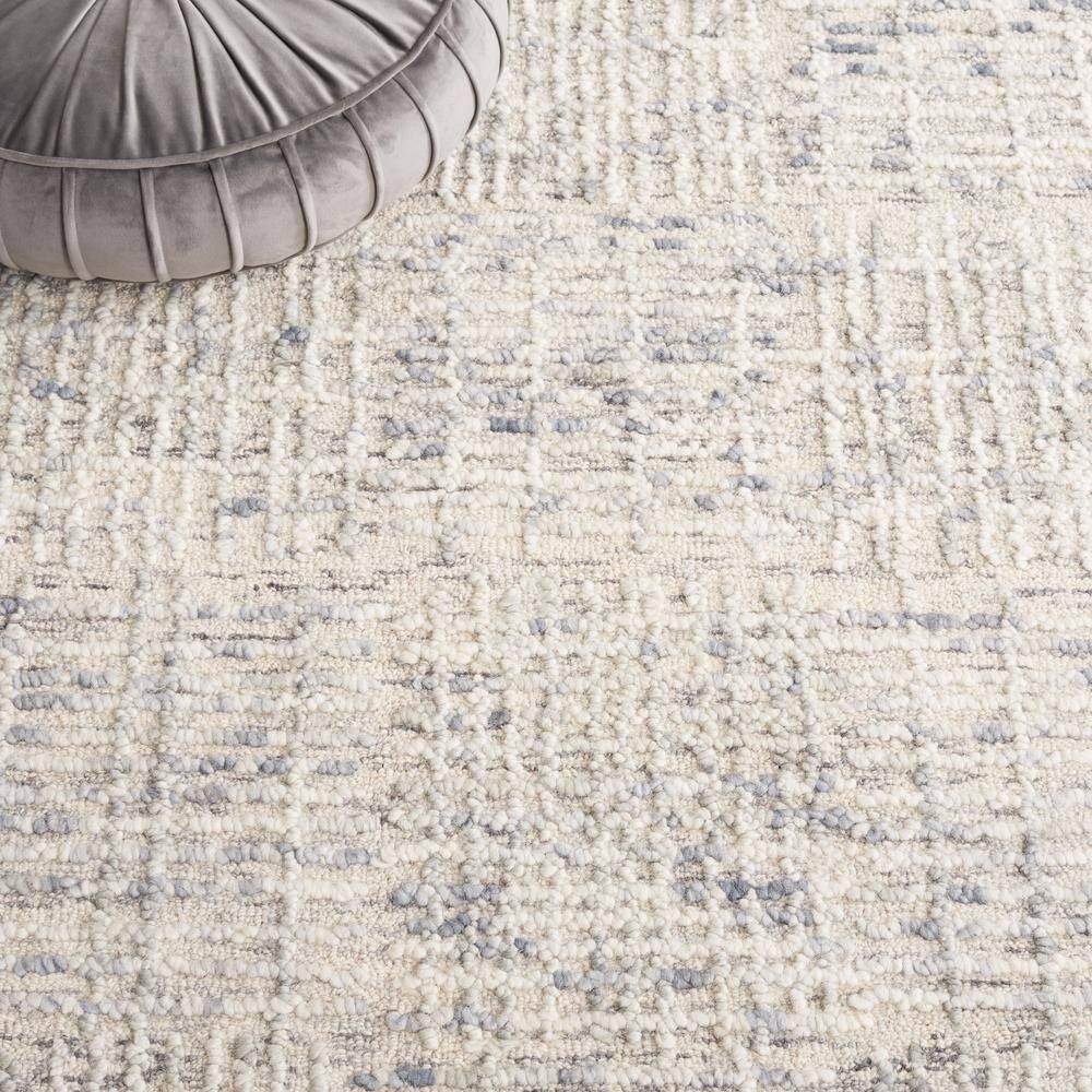 Abstract ABT275 Handmade Tufted Area Rug - Light Blue/Ivory - 5'-0" x 8'-0" - Safavieh