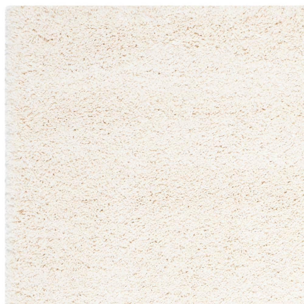 SAFAVIEH Milan Harlow Solid Plush Shag Area Rug, Ivory, 10' x 14'