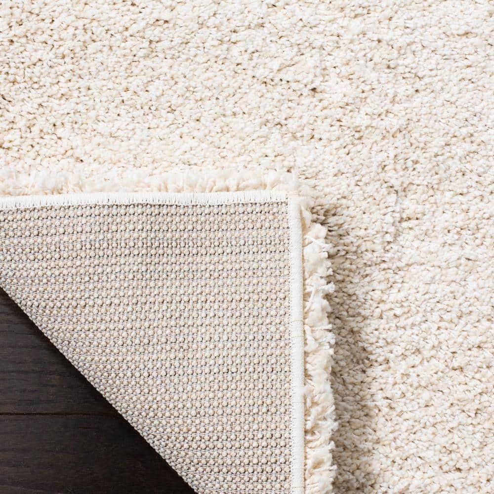 SAFAVIEH Milan Harlow Solid Plush Shag Area Rug, Ivory, 10' x 14'