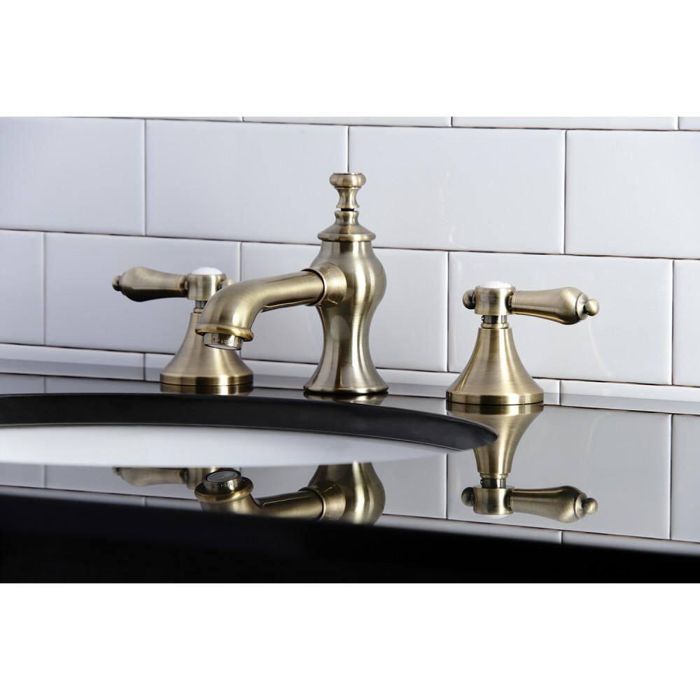 Kingston Brass Vintage Two-Handle 3-Hole Deck Mount Widespread Bathroom Faucet with Brass Pop-Up Drain